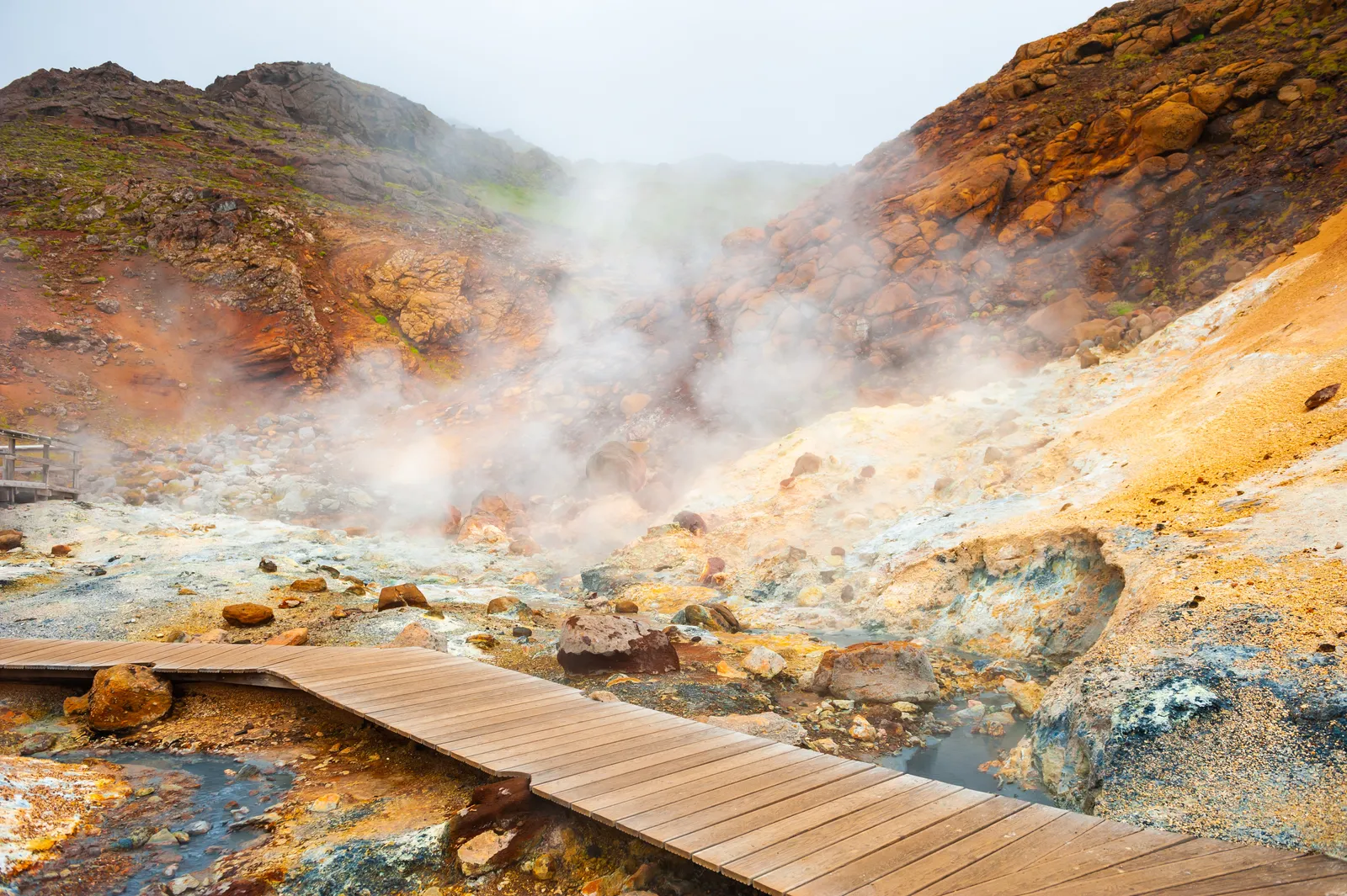 The Seltún geothermal area at Krýsuvík — boardwalks over boiling mud pots about 40 minutes from Reykjavík